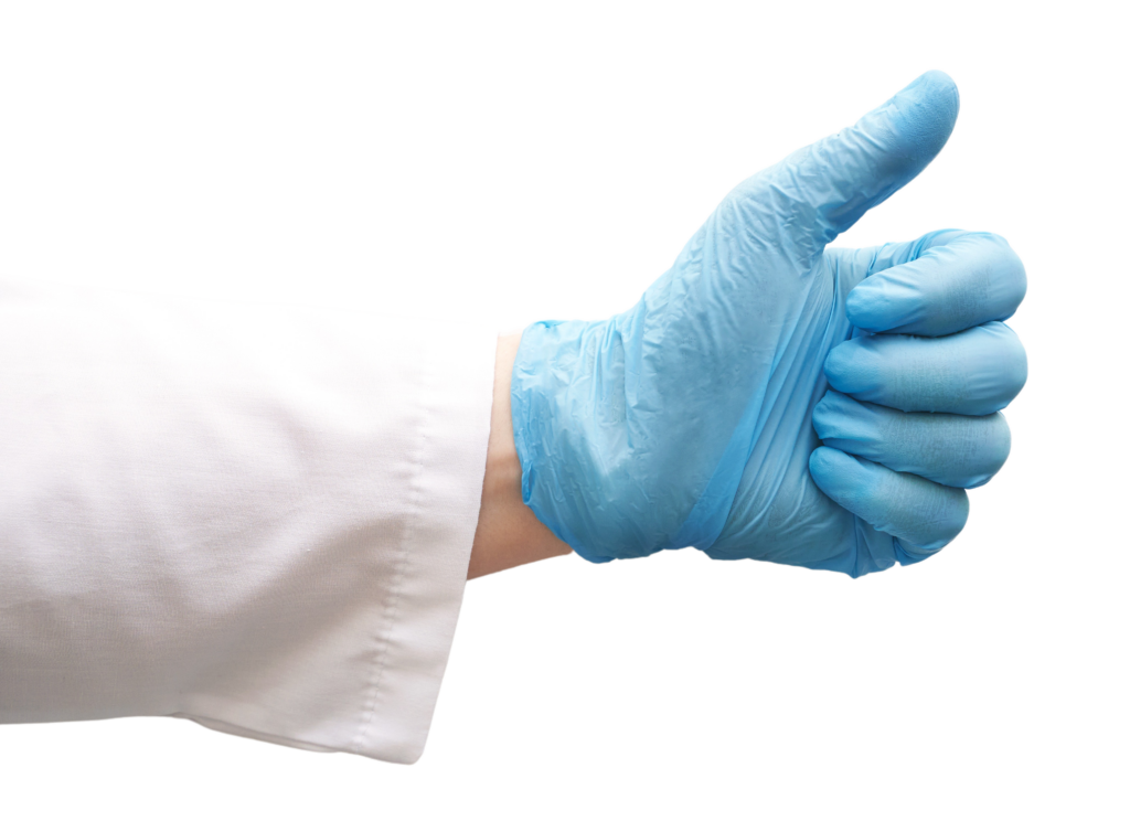 Hand in medizinischen Handschuh, mit Daumen nach oben